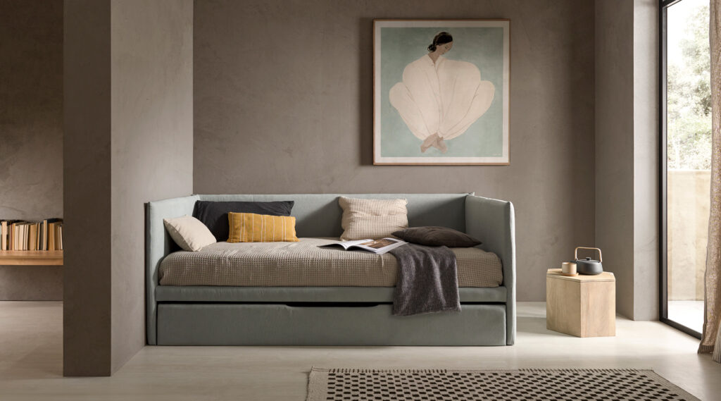 Cama nido Born tapizada con base superior en tejido 3D y somier de láminas para cama auxiliar
