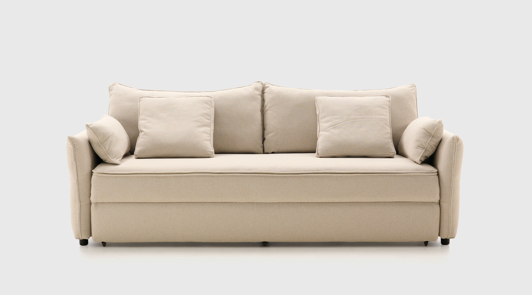 Sofá cama Saori color beige con arcón integrado, mecanismo transversal y cojines desenfundables