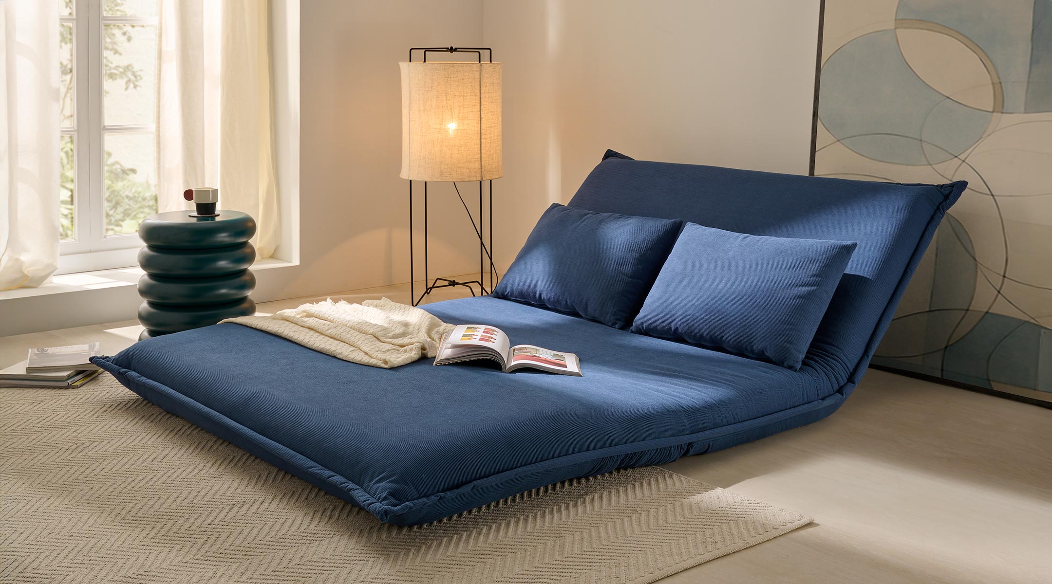 Sofá Cama North - Posiciones y Confort HR Detalle de las posiciones de la estructura articulada del sofá cama North azul con espuma HR.