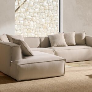 Sofá Chaise Longue Derecha Green - Adu Gris - Confort Natural Detalle del tapizado y asientos del sofá Green con chaise longue derecha. Tela de tacto suave y tonos naturales para salones modernos.